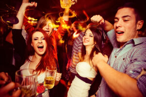 people are drinking and dancing fearlessly & Keeping the Party Going With Specialty Coverage for Nightlife Venues.